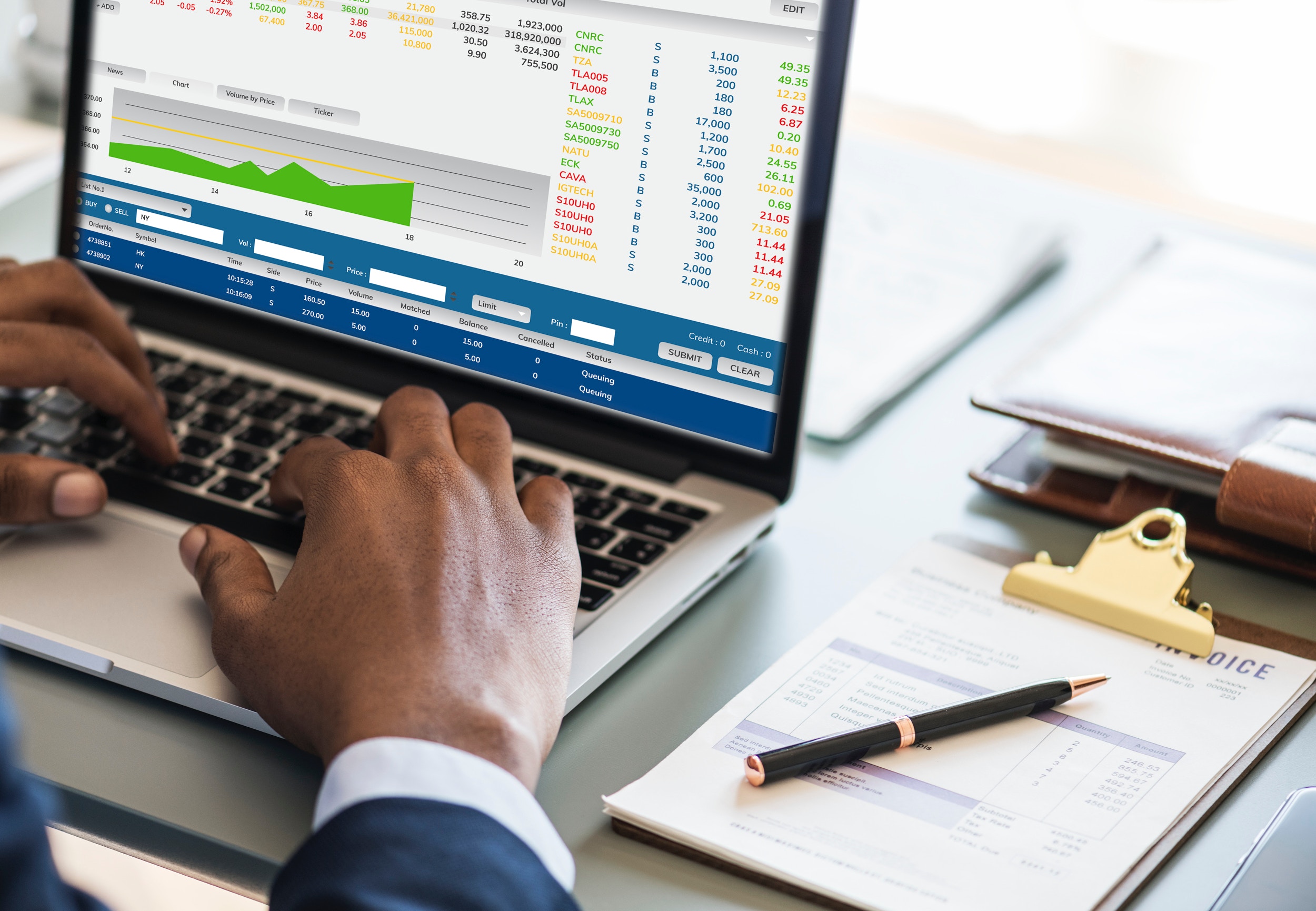 man working on a spreadsheet